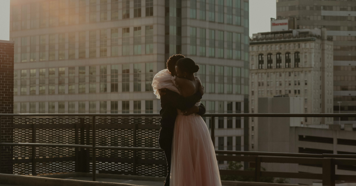couple, couple on the rooftop, couple holding each other, black love, lasting love