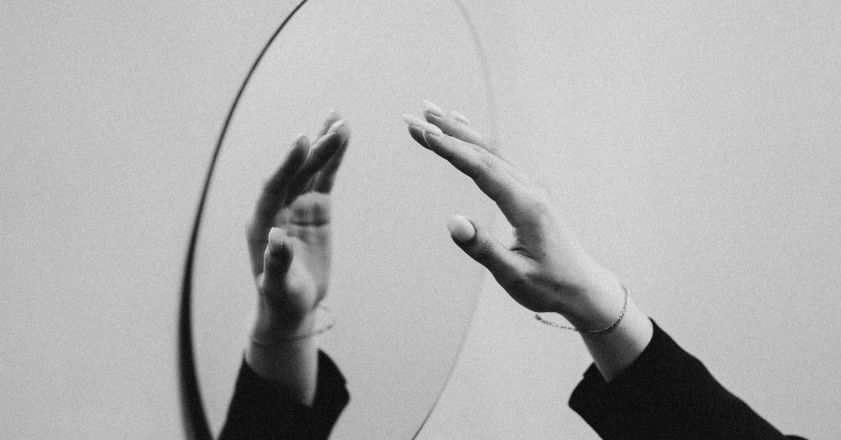 hand reflecting, mirror protrait, reflection, hand, grayscale, resilence, self reflection