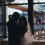 couple in love, wedding, black couple, black love, wedding ceremony, sharing a kiss, holding hands, love language