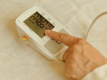 a person tracking their blood pressure